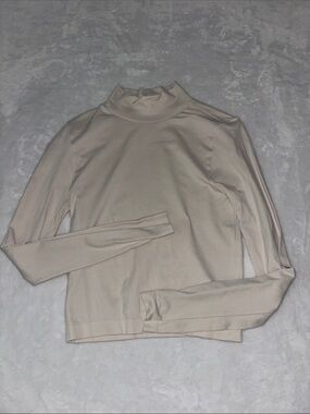 Long sleeve mock neck cream tight fitted top
